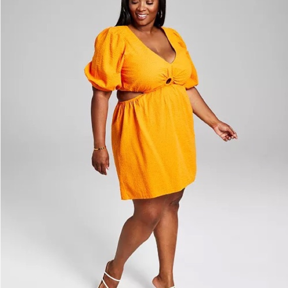 AND NOW THIS
Trendy Plus Size Keyhole Mini Dress.
Too cute!!